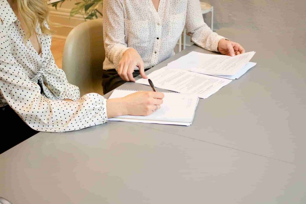 A person signing a document